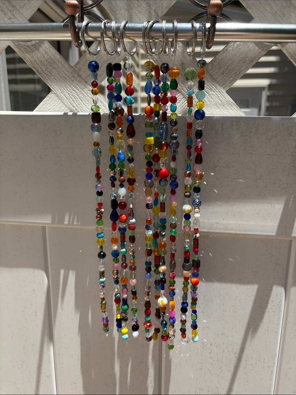Ten strands 14 inches long made with glass & crystal beads